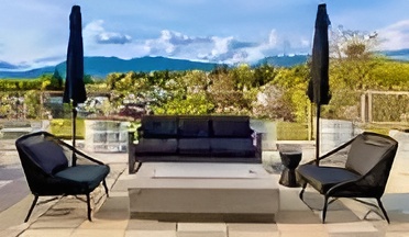 Rooftop patio — lounge seating with mountain views